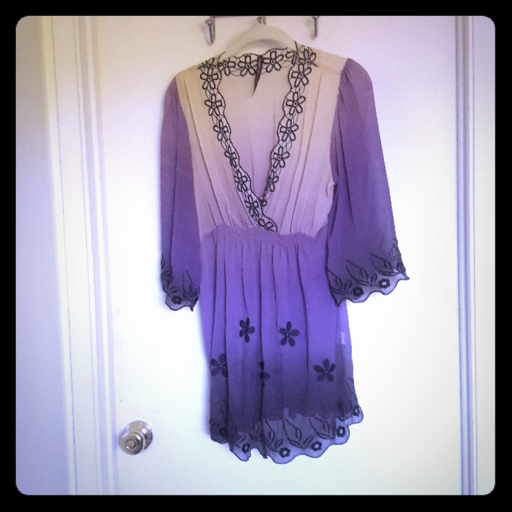 Faded purple blouse.